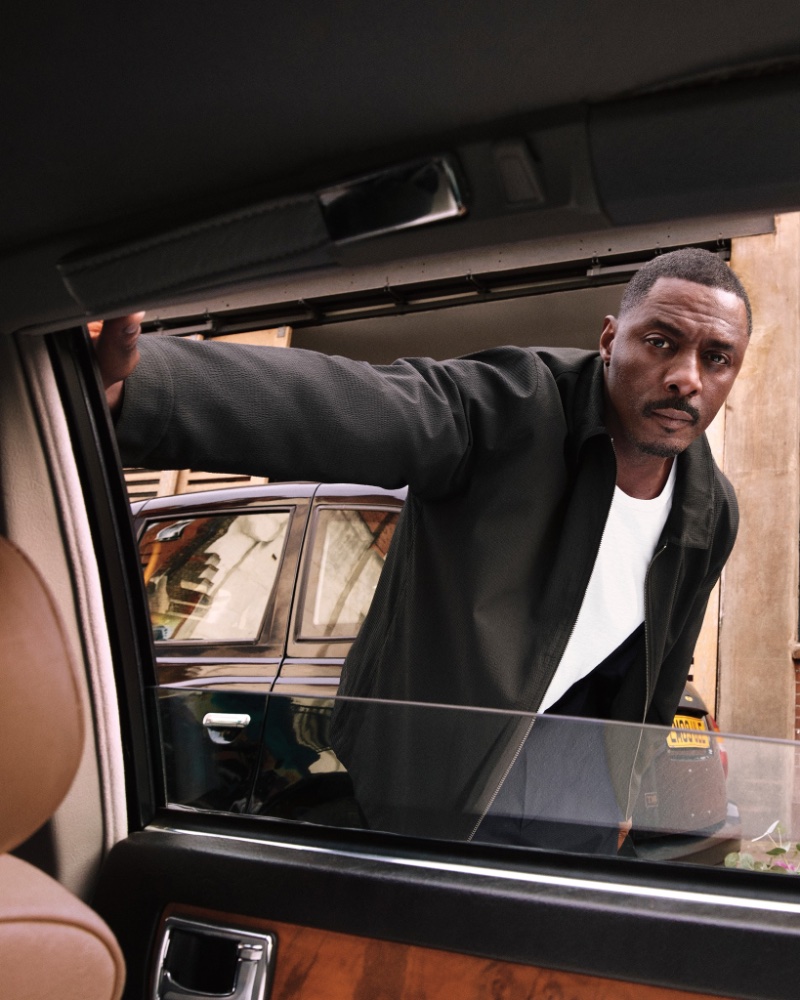 Idris Elba fronts Calvin Klein's newest advertisement in a seersucker full-zip jacket.