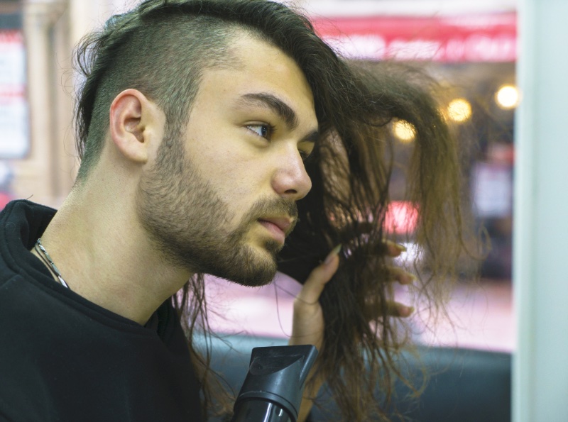 Long Hair with an Undercut Man