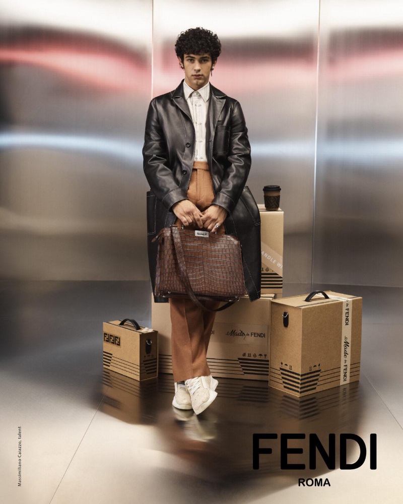 Massimiliano Caiazzo carries Fendi's spring-summer 2024 vision with a sleek leather coat and signature bag.