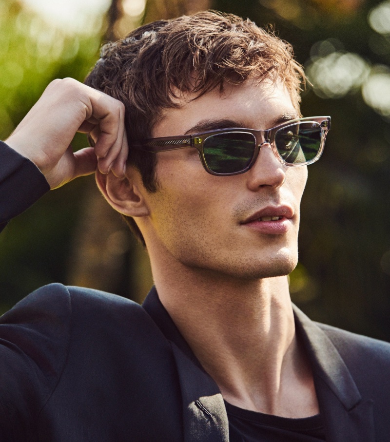 Kit Butler stars in Oliver Peoples' spring 2024 campaign, sporting the brand's Rosson Sun sunglasses.