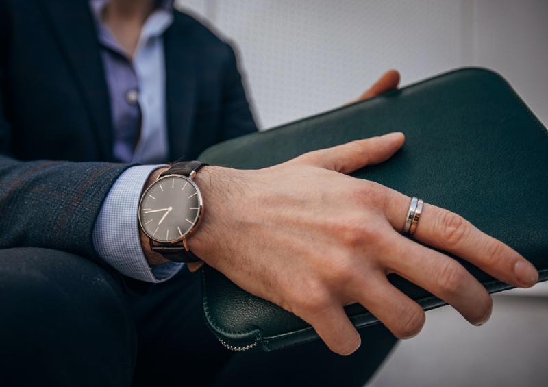 Professional Man Wearing Ring Watch