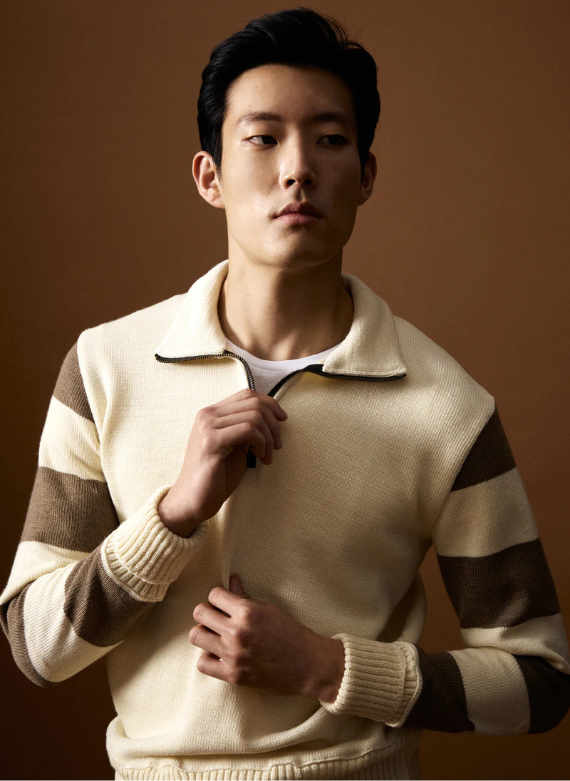 A smart vision, Juhyung Kang dons a Todd Snyder x Denhen motorcycle sweater in canvas.
