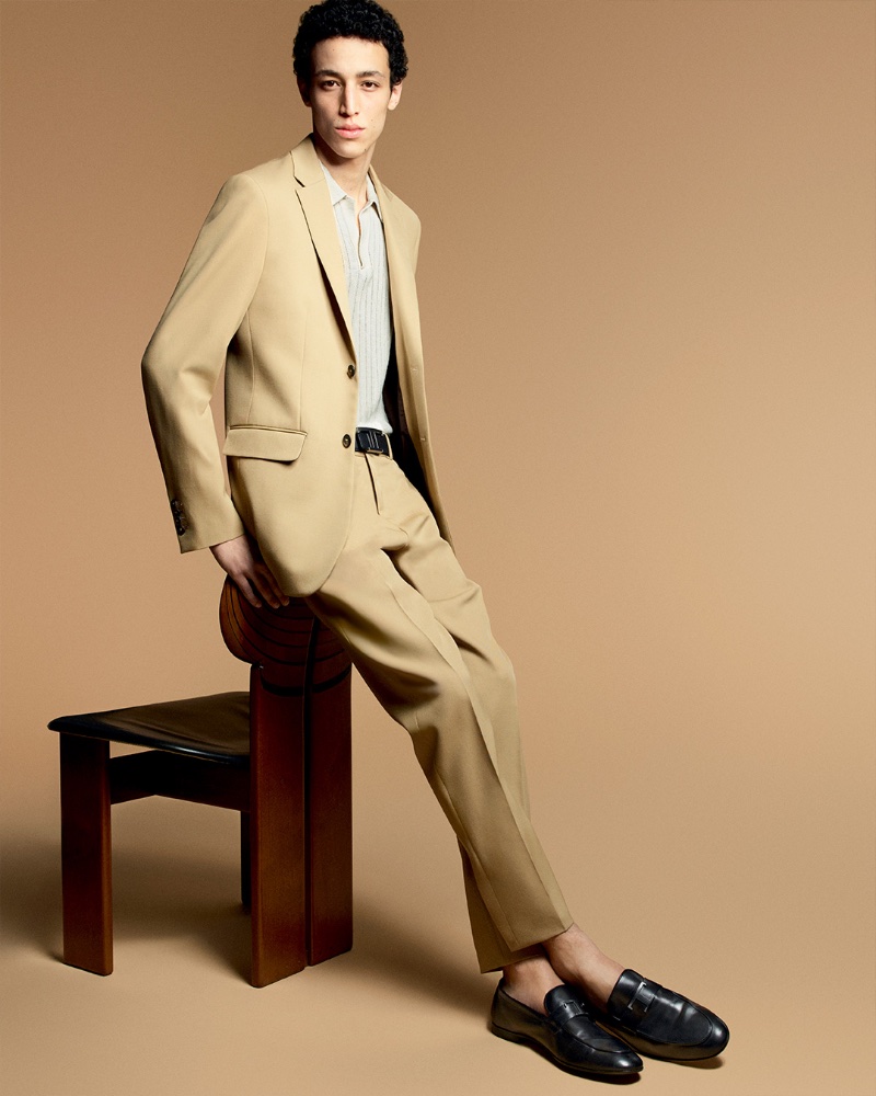In Tod's pre-spring 2024 attire, Walid Fiher epitomizes understated sophistication.