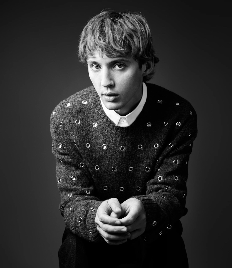 Actor Troye Sivan appears in a black-and-white portrait for Prada's spring 2024 advertisement. 