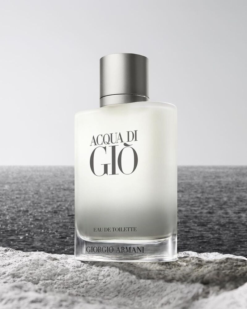 Giorgio Armani Acqua Di Giò is captured against a tranquil sea backdrop.