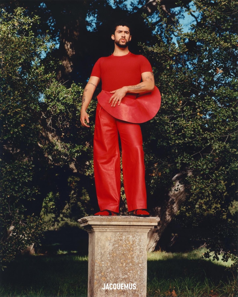 A bold statement in red, Bad Bunny showcases a striking JACQUEMUS spring-summer 2024 silhouette.