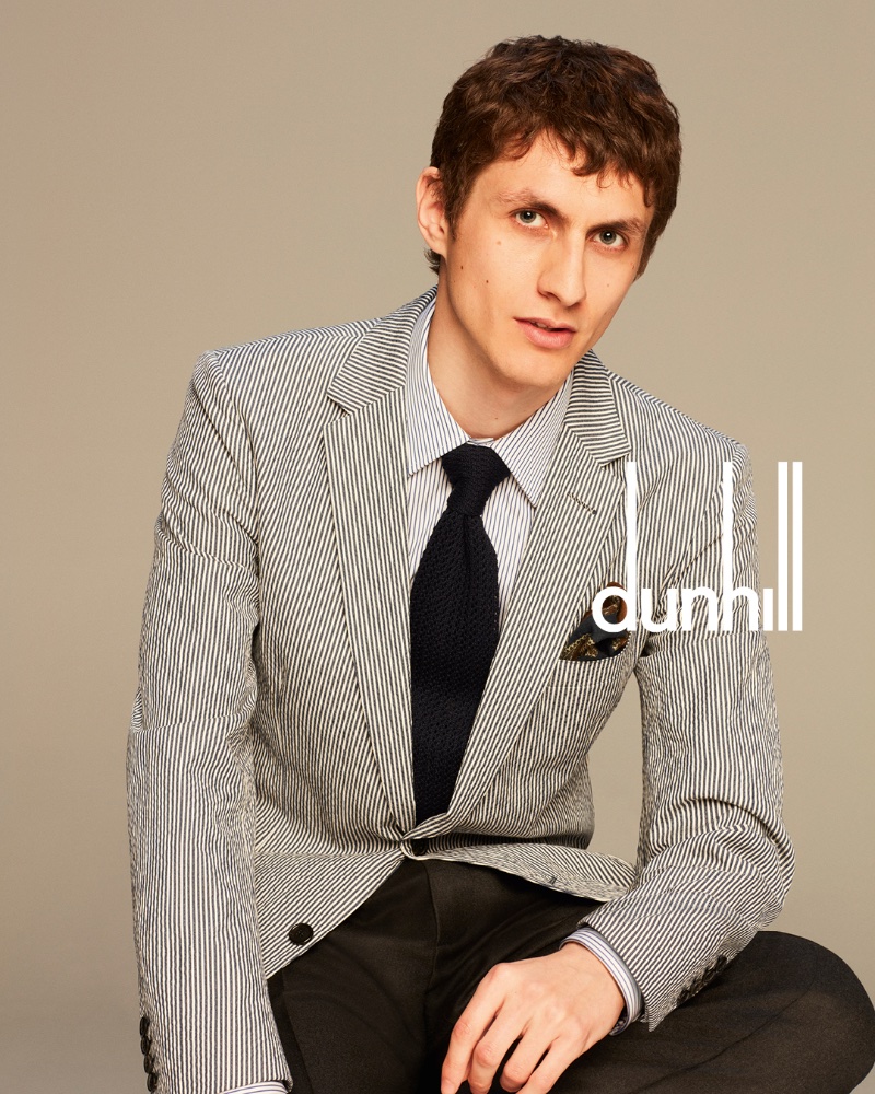 Mixing stripes, Henry Kitcher stars in Dunhill's spring-summer 2024 campaign.