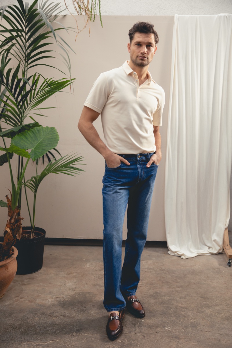 Showcasing Hockerty's versatility, Stefan Pollmann pairs a crisp polo with timeless denim for spring-summer 2024.