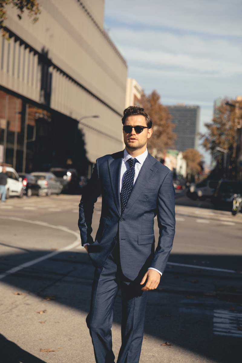 Urban chic meets classic tailoring as Stefan Pollmann sports Hockerty's sharp blue suit for the 2024 spring-summer collection.