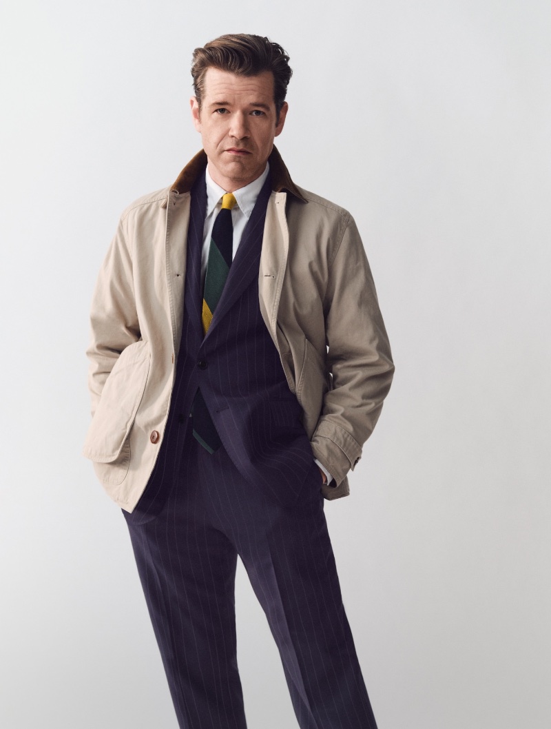 Dressed to impress, Michael Sebastian wears a 1983 Heritage barn jacket over a Crosby classic-fit suit, broken-in Oxford shirt, and silk tie.