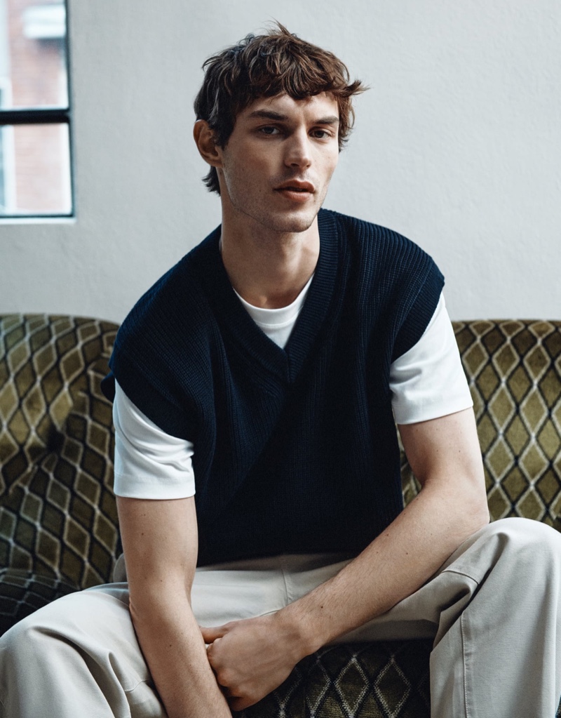 A smart vision, Kit Butler dons a ribbed sweater vest from Massimo Dutti. 