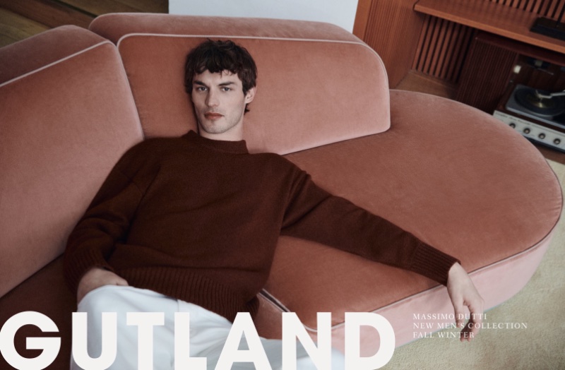 Kit Butler wears a cozy sweater by Massimo Dutti. 