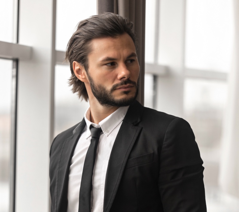 Medium Length Slick Back Hairstyle Men