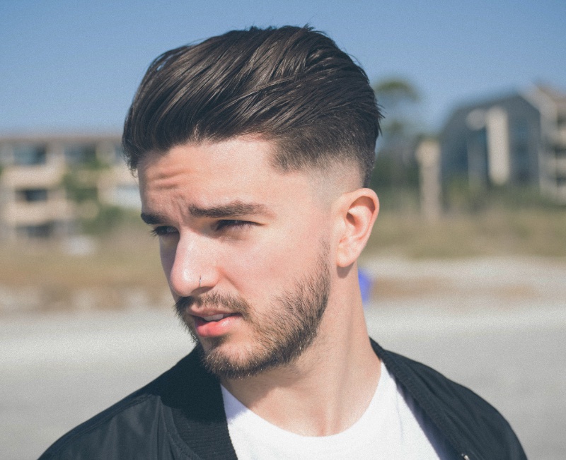 Medium Length Slick Back Hairstyle Men