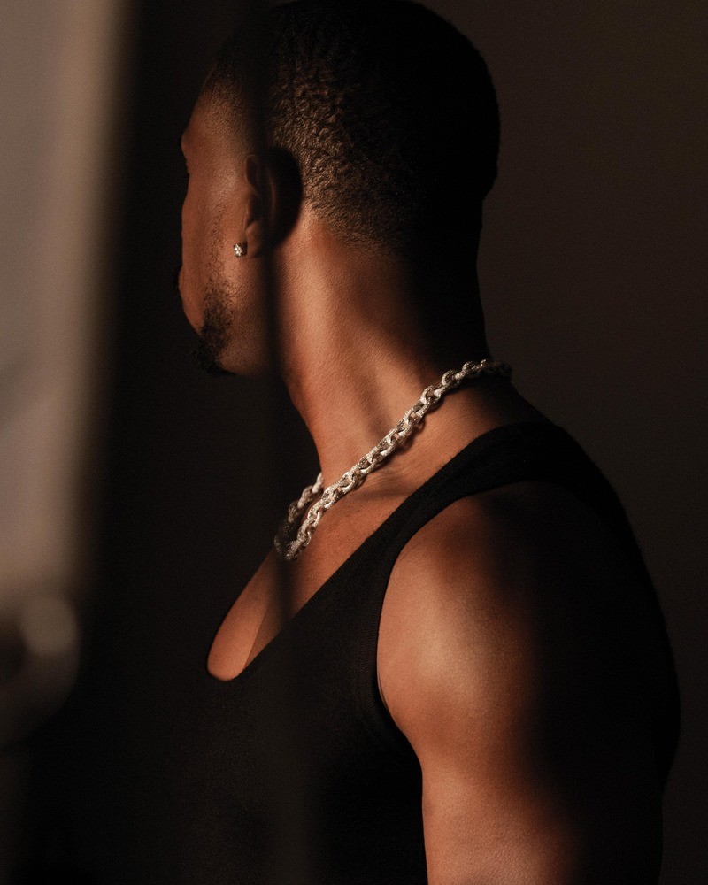 Actor Michael B. Jordan embraces modern elegance with a David Yurman chain necklace for the brand's spring 2024 campaign.