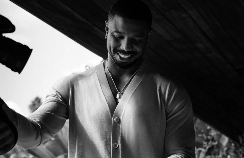 All smiles, Michael B. Jordan wears tag necklaces from David Yurman's Chevron collection.