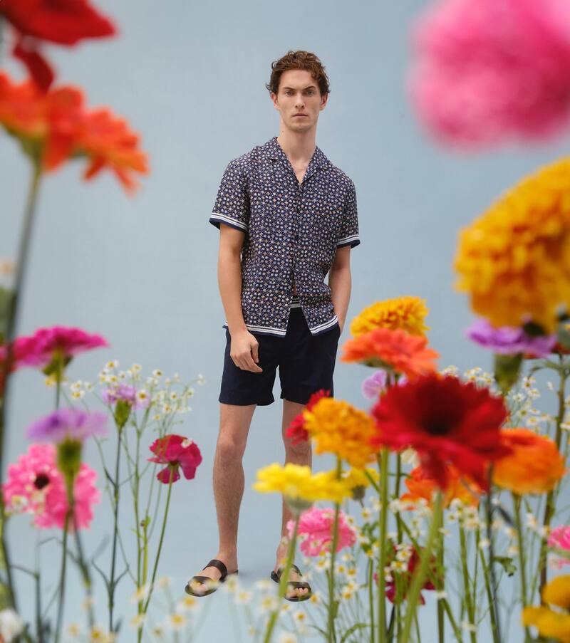 Luc Defont-Saviard dons a printed shirt with shorts from Orlebar Brown.