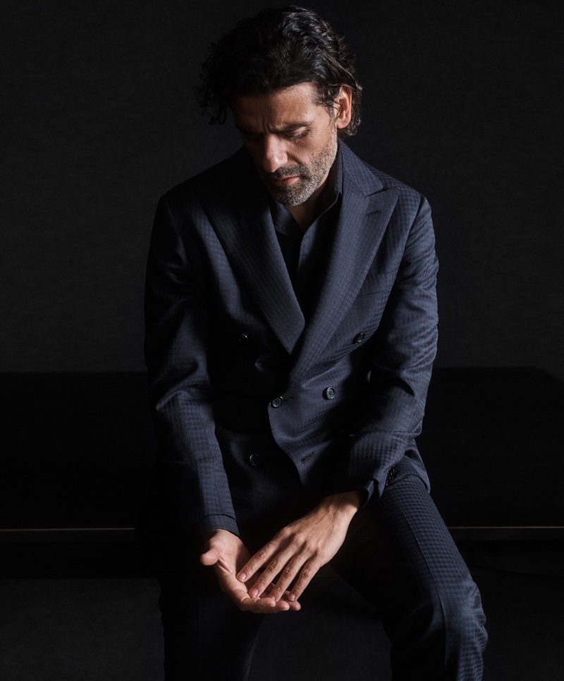 Oscar Isaac is a chic vision in a Brioni double-breasted suit for the brand's spring-summer 2024 campaign.