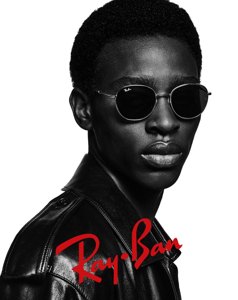 Adamu Bulus embodies effortless cool in Ray-Ban's campaign, featuring round metal sunglasses.