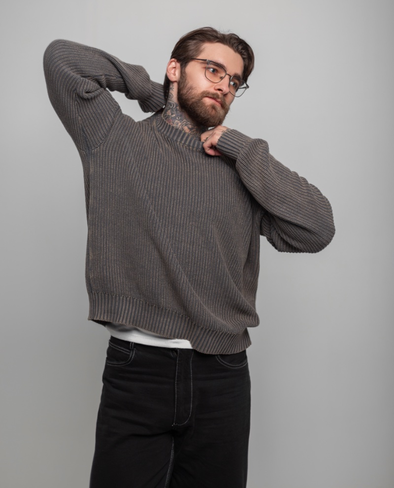 Embrace the cool weather with a sophisticated ribbed knit sweater.