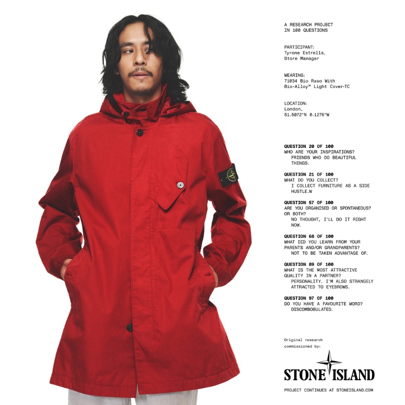 Tyrone Estrella makes a red statement in Stone Island's 71034 Bio Raso with Bio-Alloy light Cover-TC hooded trench.