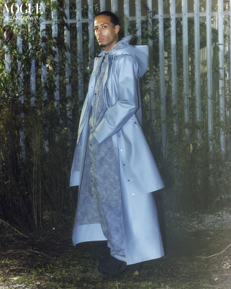 Virgil van Dijk wears a rain jacket and triple coat by Rains for Vogue Scandinavia.