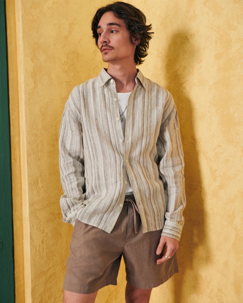 Embracing spring, Sebastião Hungerbühler wears an Abercrombie & Fitch linen button-up shirt.