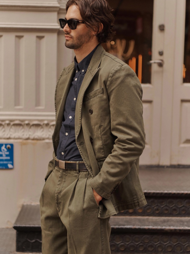 A smart vision, Gordon Winarick dons Alex Mill’s double-breasted blazer and pleated pants with a cotton twill shirt.
