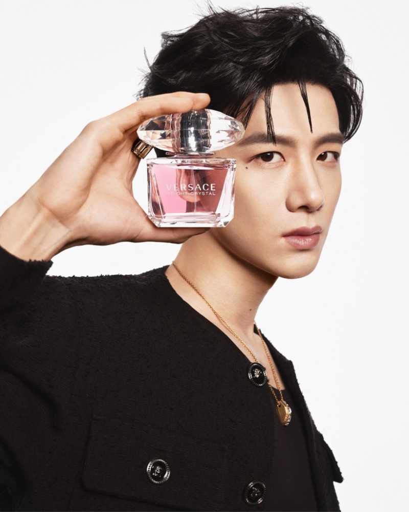 Bai Jingting holds a bottle of Versace's popular Bright Crystal perfume.