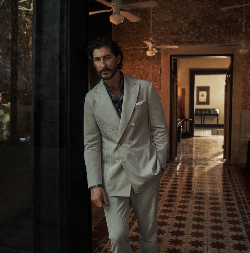Ryan Porter is a dashing vision in a double-breasted suit for Brunello Cucinelli's spring-summer 2024 campaign.