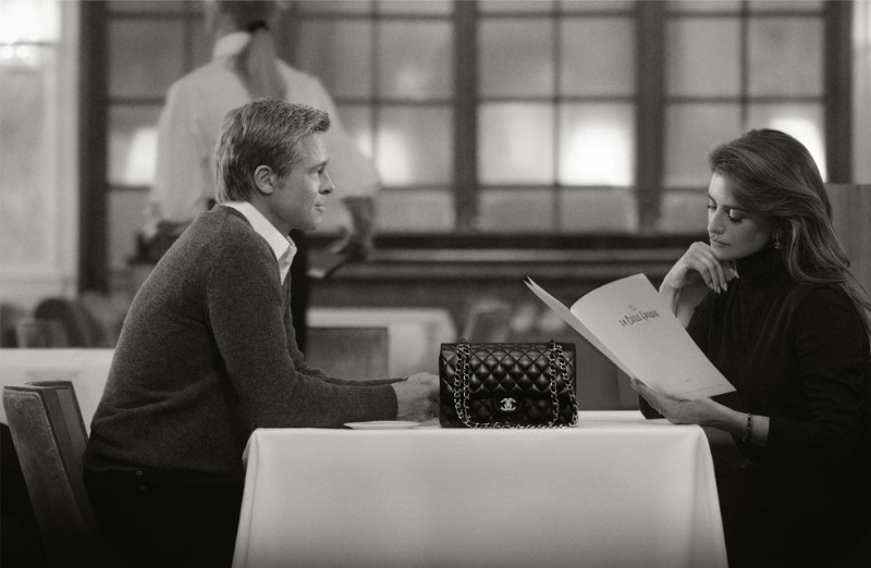 Brad Pitt and Penélope Cruz star in the Chanel Iconic Handbag advertisement.