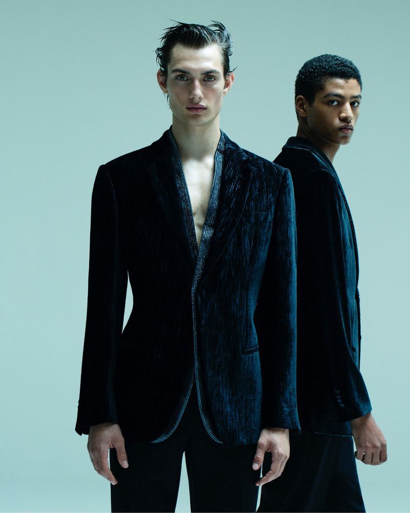 Models Thatcher Thornton and Rapha Keijzer wear velvet blazers in navy from the Giorgio Armani Celestial capsule collection. 
