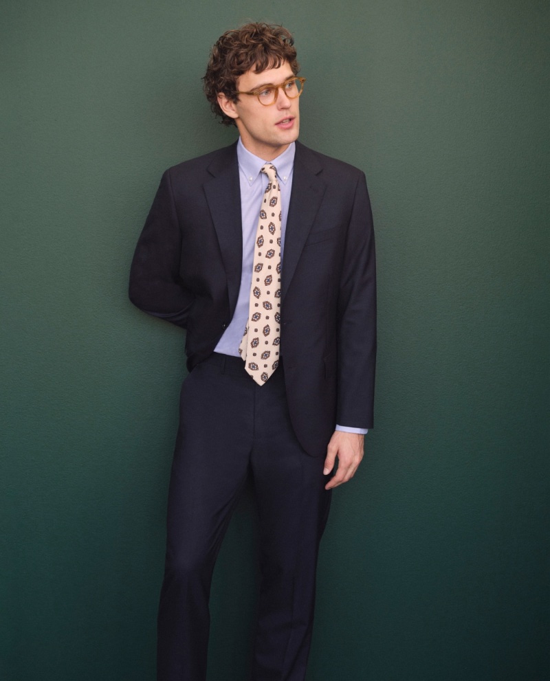 Conor Fay sports a J.Crew Crosby classic-fit Italian wool suit with a Bowery wrinkle-free dress shirt and an Italian silk tie.