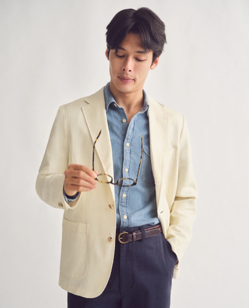 Taro Nakamura models a Crosby Classic-fit suit jacket with a midweight denim workshirt and Giant-fit chinos.