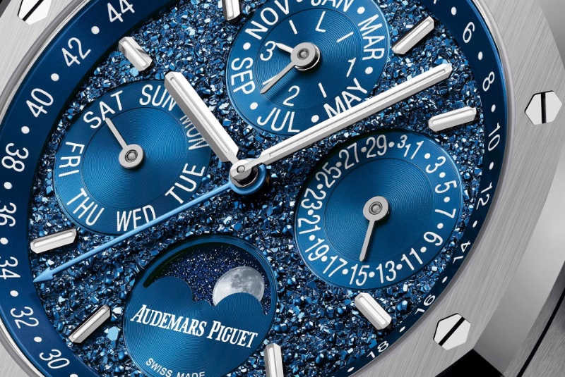 The Audemars Piguet Royal Oak's dial, reminiscent of a starry night sky, showcases an intricate perpetual calendar mechanism.