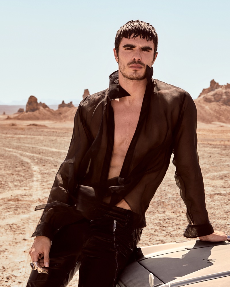 Diego Villarreal wears a sheer black shirt for the K by Dolce & Gabbana Eau de Parfum Intense campaign.