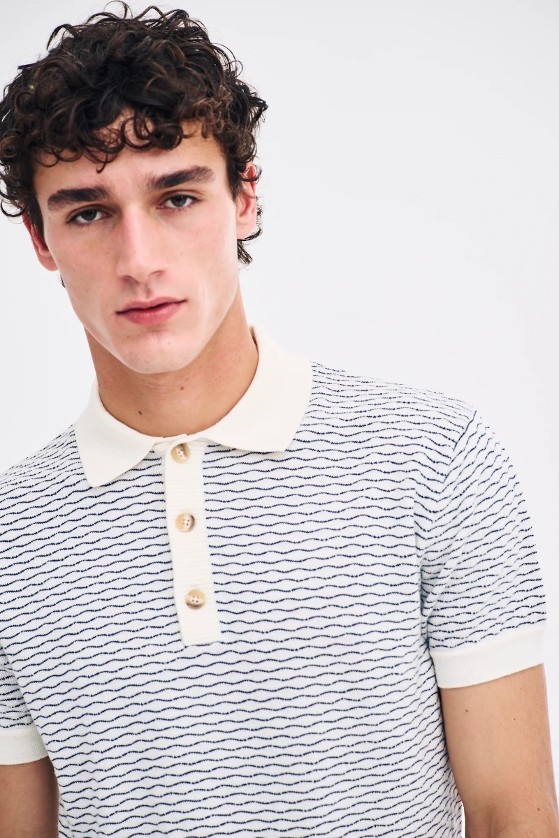 Carlos Galobart dons a nautical-inspired polo from King & Tuckfield's spring-summer 2024 collection.