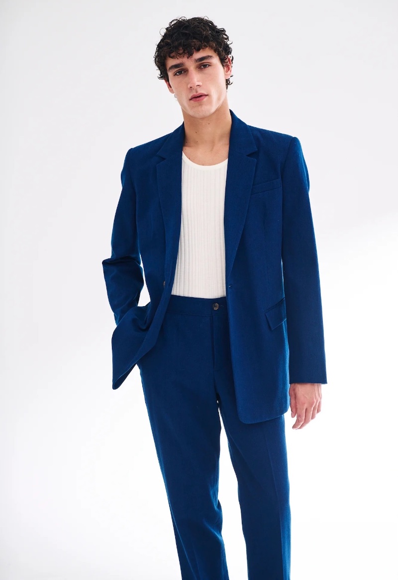 Carlos Galobart models a vibrant blue suit from King & Tuckfield's spring-summer 2024 collection.