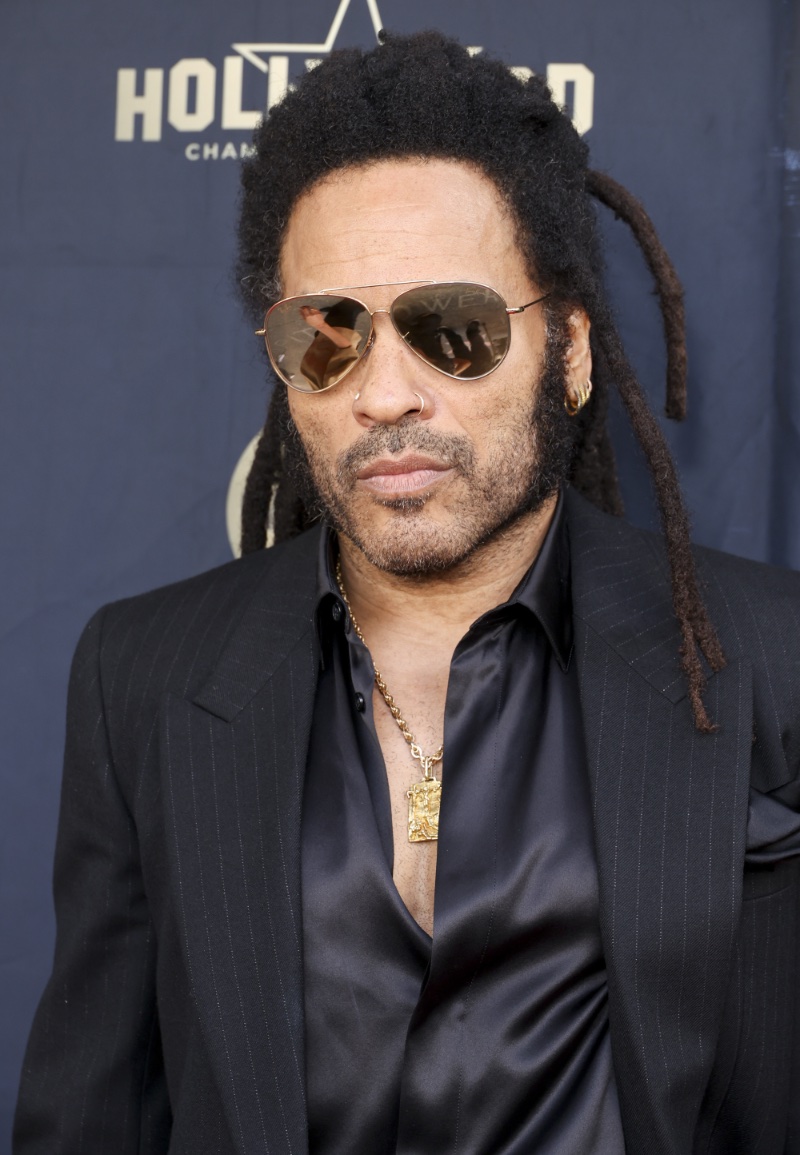 Lenny Kravitz wears Ray-Ban Reverse sunglasses at his Hollywood Walk of Fame ceremony. 