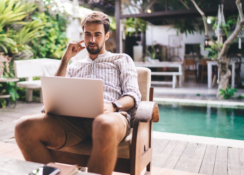 Man Laptop Poolside