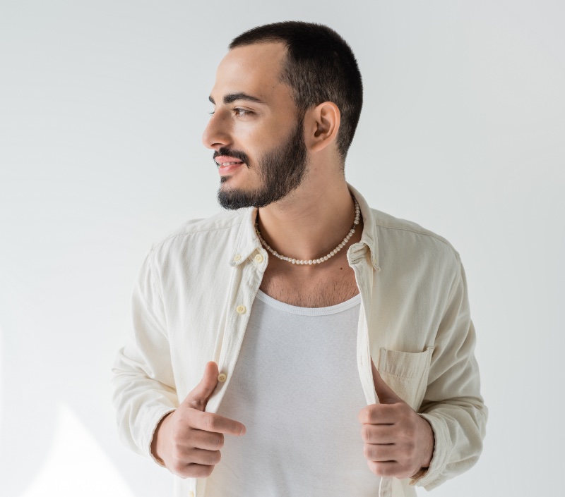 Man Wearing Pearl Necklace