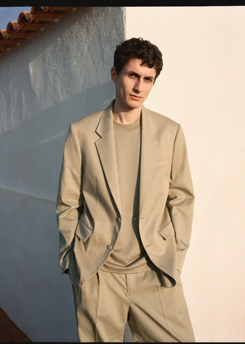 Model Henry Kitcher wears a monochromatic, tailored number by Mango.