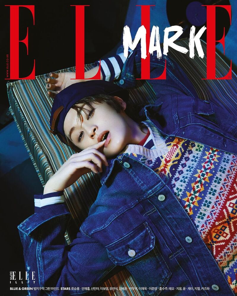 Mark Lee captures attention on the cover of Elle Korea in a denim Polo Ralph Lauren jacket and a vibrant V-neck sweater.