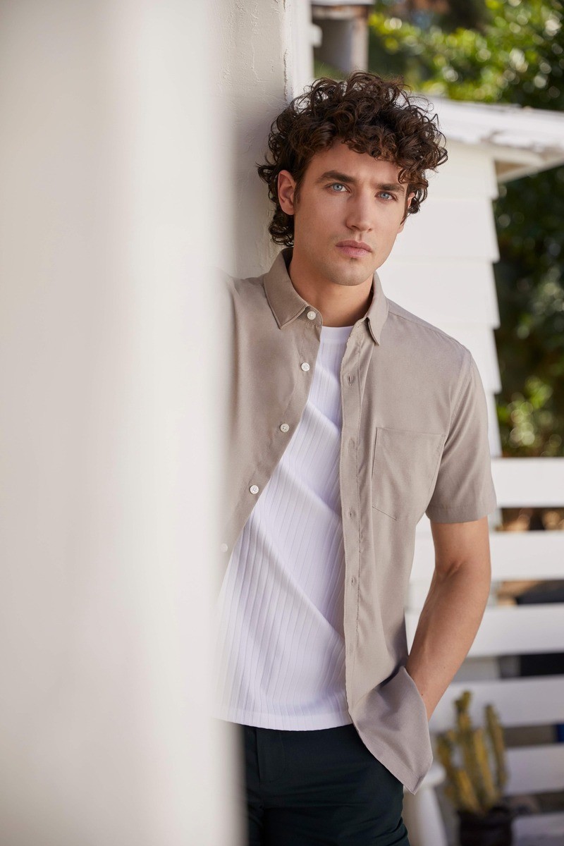 Federico Novello mixes textures in a ribbed t-shirt and short-sleeve shirt from Perry Ellis.
