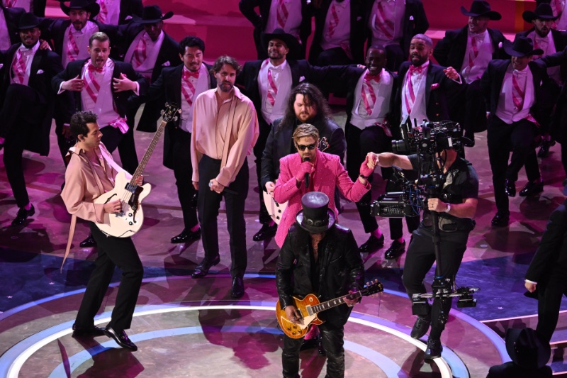 Actor Ryan Gosling performs I'm Just Ken alongside Mark Ronson and Slash at the Oscars.