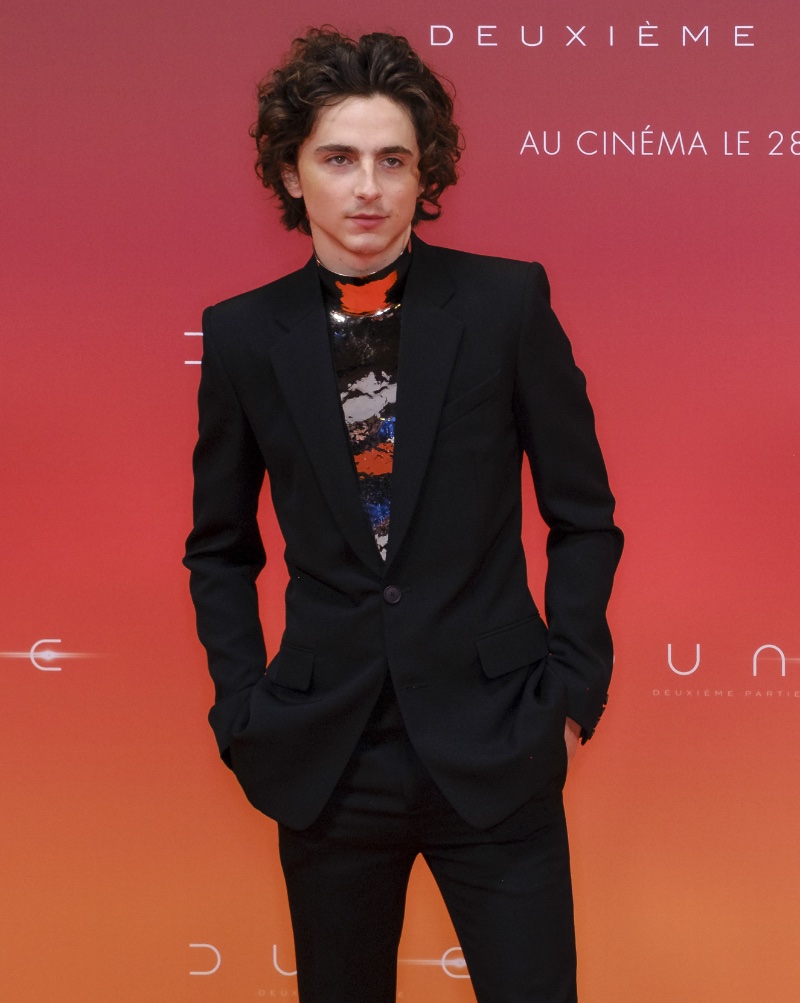 Timothée Chalamet wears Givenchy couture to a Dune: Part Two fan screening in Paris, France.