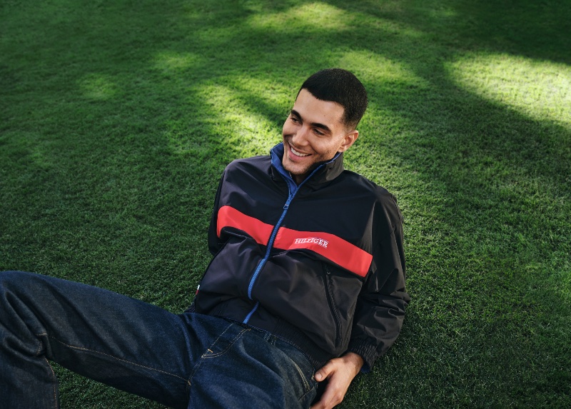 Smiling ear to ear, Fai Khadra appears in Tommy Hilfiger's spring 2024 campaign.