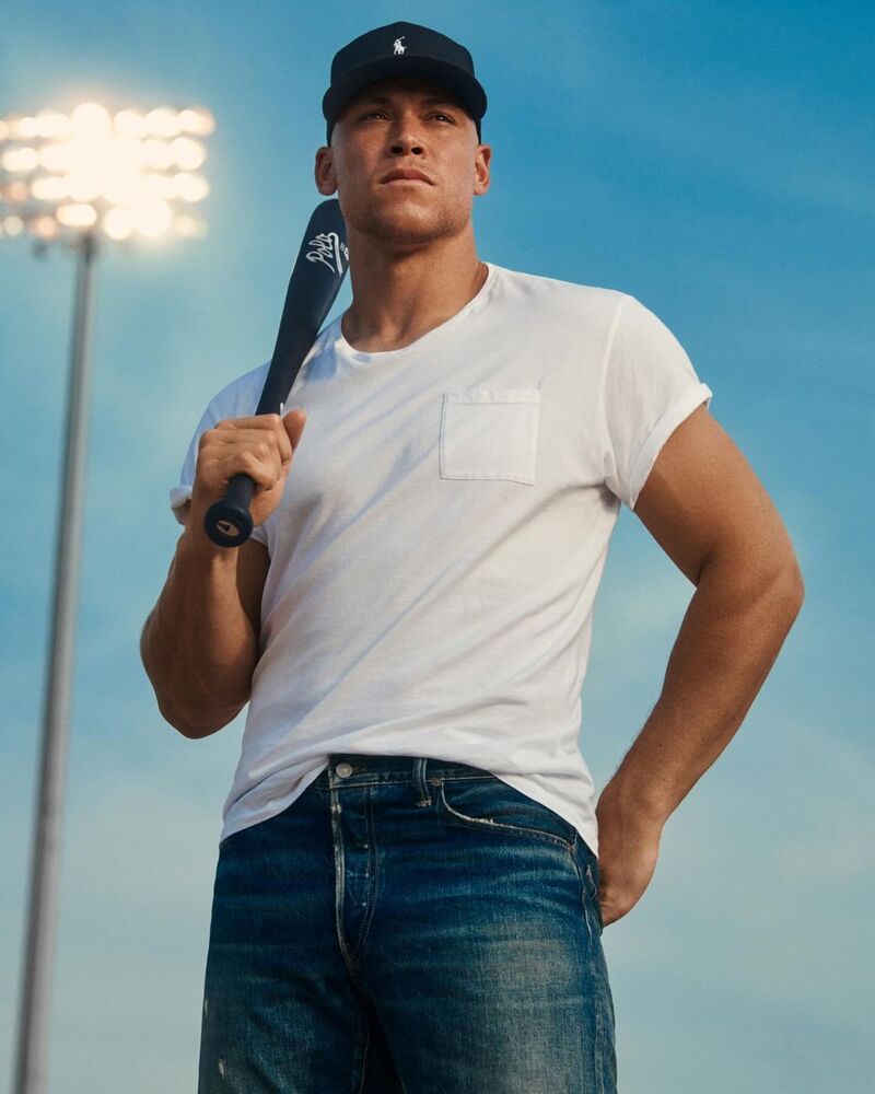 New York Yankees captain Aaron Judge appears in Ralph Lauren's Polo 67 Eau de Toilette advertisement. 