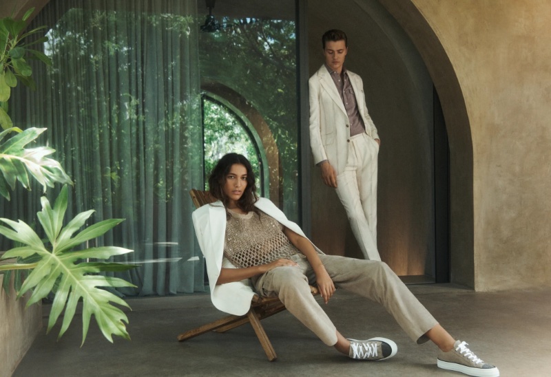 Models Nour Rizk and Lucky Blue Smith inspire in neutral-colored outfits from Brunello Cucinelli's spring-summer 2024 collection.