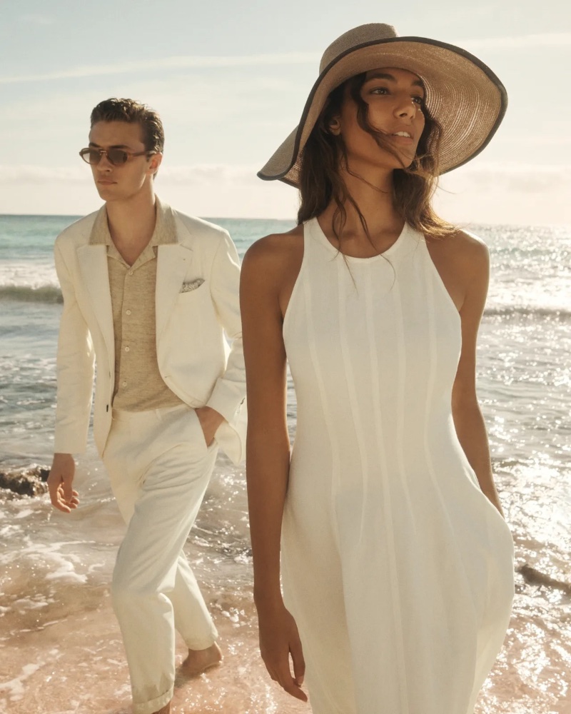 By the ocean's edge, Lucky Blue Smith and Nour Rizk epitomize coastal elegance in Brunello Cucinelli. 